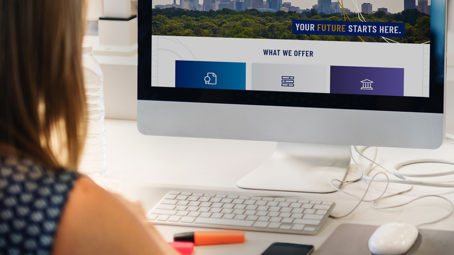 Woman on computer visiting ECE's website