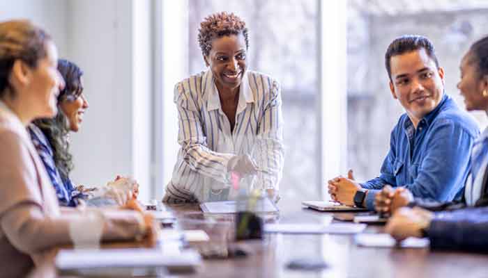 A manager with team members